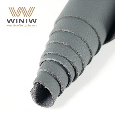 China Führender 1.2mm Microfiber PU Leather Fabric Automotive Interior Material Lieferanten
